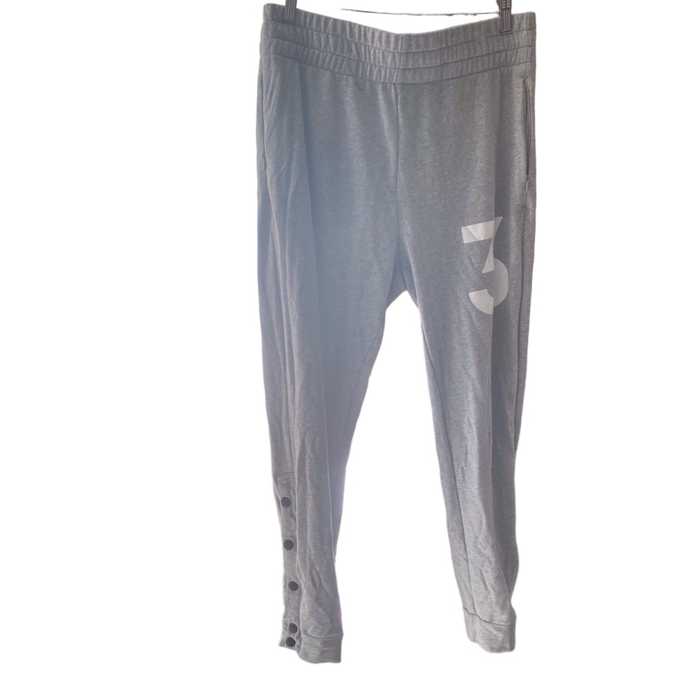 Warrior grey joggers with button detail on the bottom leg size XL euc
